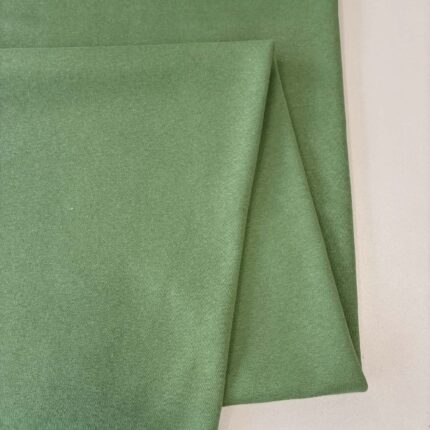 Pašiltintas, storas trikotažas Šalavijo žalia